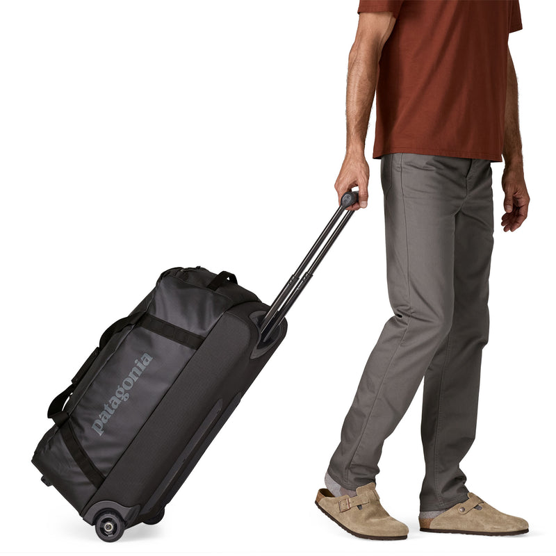 Load image into Gallery viewer, Black Hole Wheeled Duffel 70L