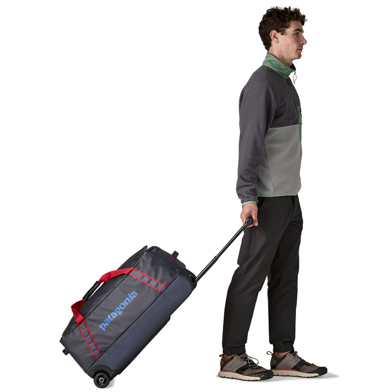 Load image into Gallery viewer, Black Hole Wheeled Duffel 70L