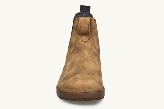Brown leather boot on a white background