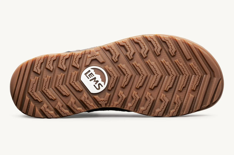 Load image into Gallery viewer, Brown shoe sole with a visible brand logo on a white background
