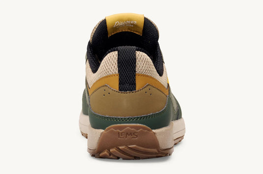 Back view of a multicolored sneaker with visible brand name on a white background