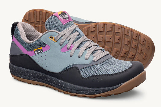 Pair of blue and gray sneakers with pinkish purple accents and brown soles 