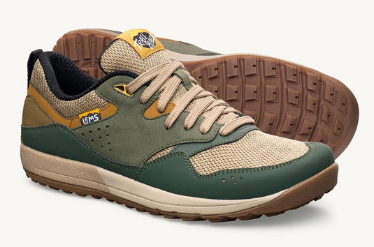 A pair of low-top sneakers shown on a clean white background, with one shoe facing forward and the other behind it to display the sole. The shoes feature a color-blocked design with dark green suede, beige mesh, tan overlays, and a brown rubber outsole.