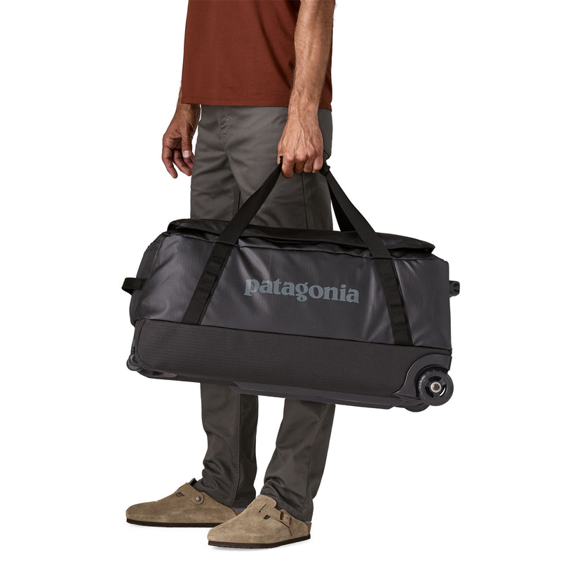 Load image into Gallery viewer, Black Hole Wheeled Duffel 70L
