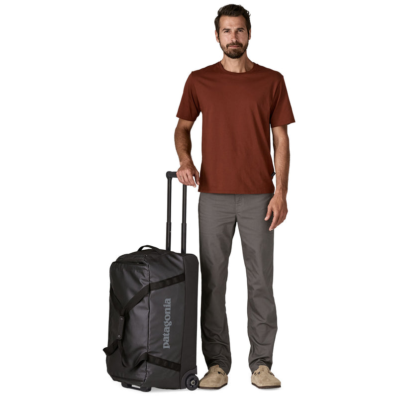 Load image into Gallery viewer, Black Hole Wheeled Duffel 70L
