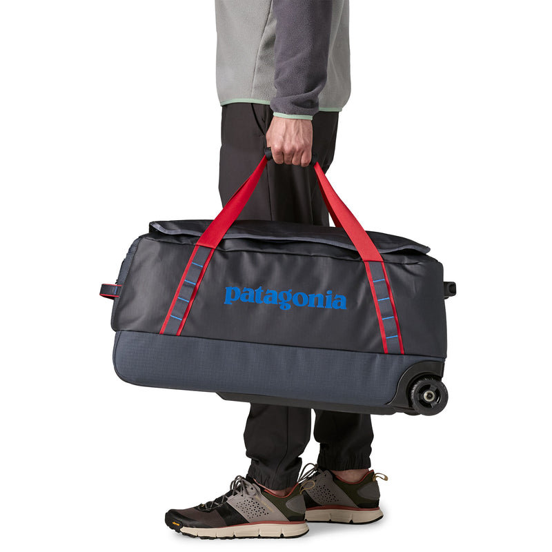 Load image into Gallery viewer, Black Hole Wheeled Duffel 70L
