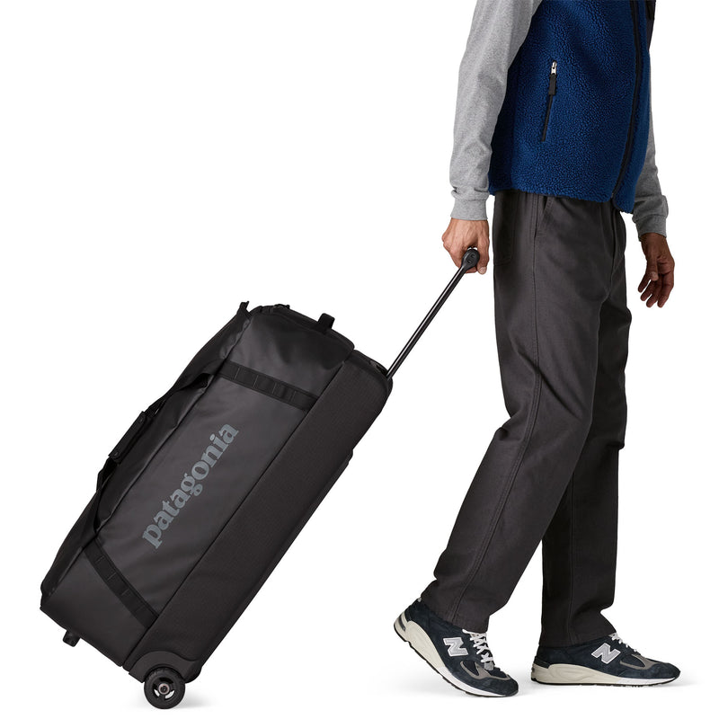 Load image into Gallery viewer, Black Hole Wheeled Duffel 100L

