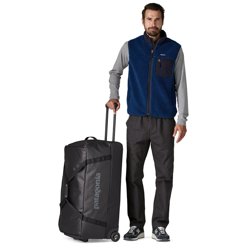 Load image into Gallery viewer, Black Hole Wheeled Duffel 100L
