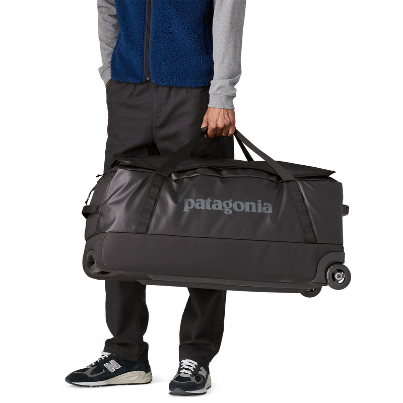 Load image into Gallery viewer, Black Hole Wheeled Duffel 100L
