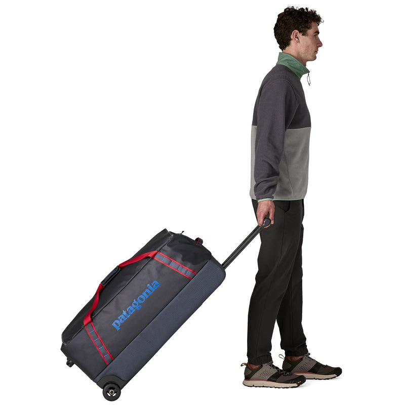 Load image into Gallery viewer, Black Hole Wheeled Duffel 100L
